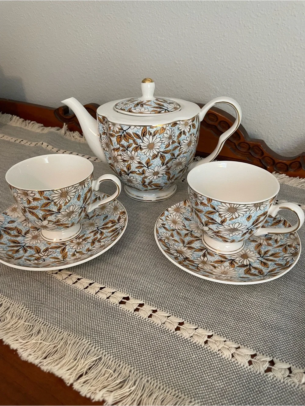 Elegant Floral Porcelain Teapot and Cup Set in Blue and Gold